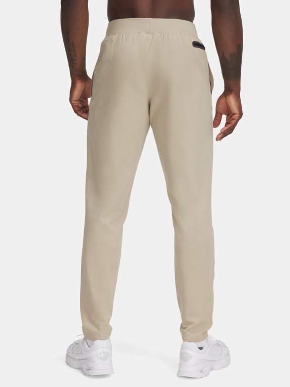 Штани Under Armour Unstoppable Tapered коричневі