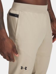 Штани Under Armour Unstoppable Tapered коричневі