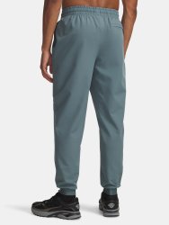 Tepláky Under Armour Unstoppable Woven Jogger Man Blue