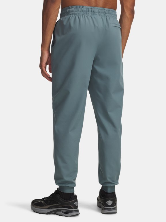 Tepláky Under Armour Unstoppable Woven Jogger Man Blue