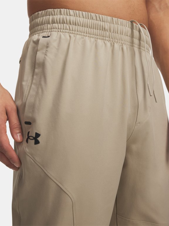 Штани Under Armour Unstoppable Tapered Pants Man коричневі