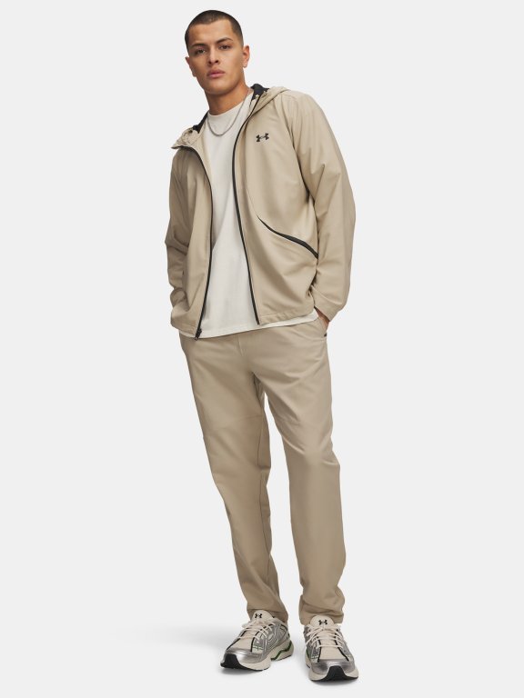 Штани Under Armour Unstoppable Tapered Pants Man коричневі