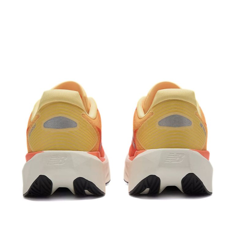 New Balance FuelCell Rebel v5 M - помаранчевий